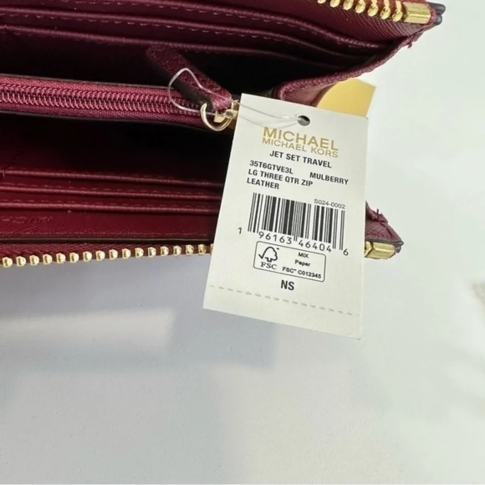 Michael Kors Large three Quarter zip Leather wallet in Mulberry